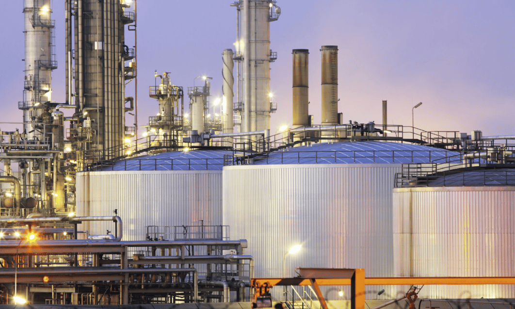 a large industrial plant with several large tanks