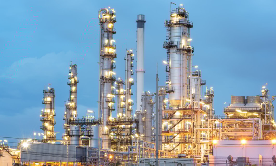 a large industrial plant with persony towers