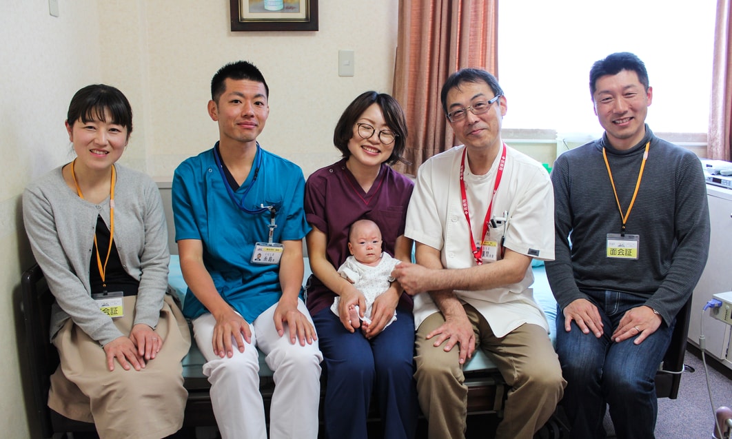 a group of people sitting on a couch