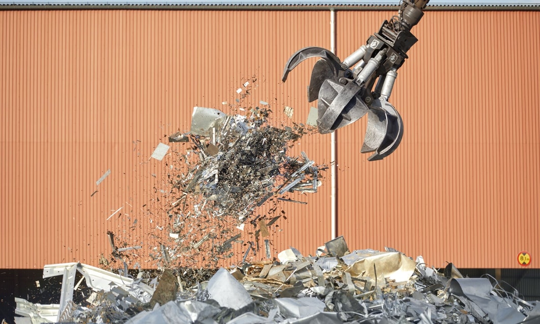 a claw grabber with metal debris