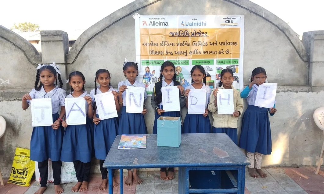 a group of childs holding signs