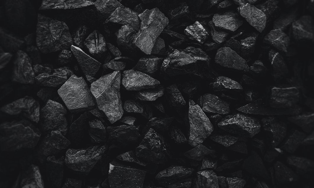 a pile of black rocks