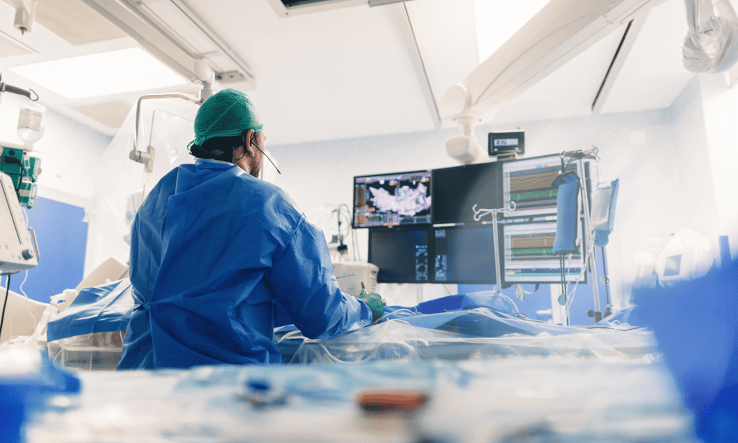 a person in a blue uniform in a room