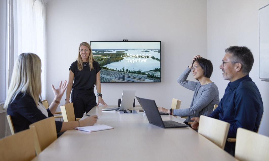 a group of people sitting around a table