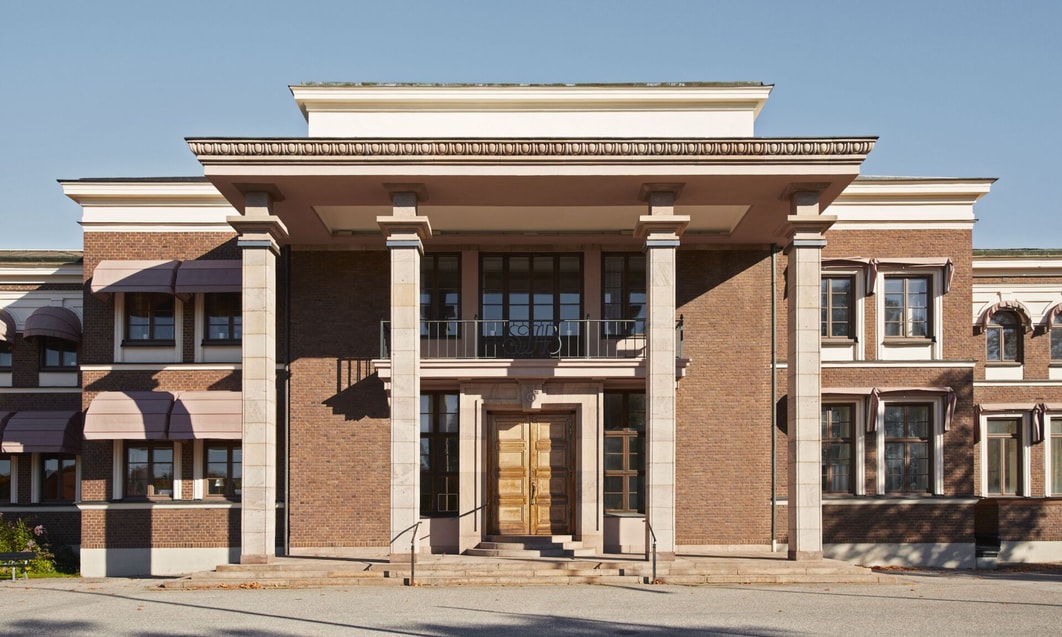 a building with columns and a balcony