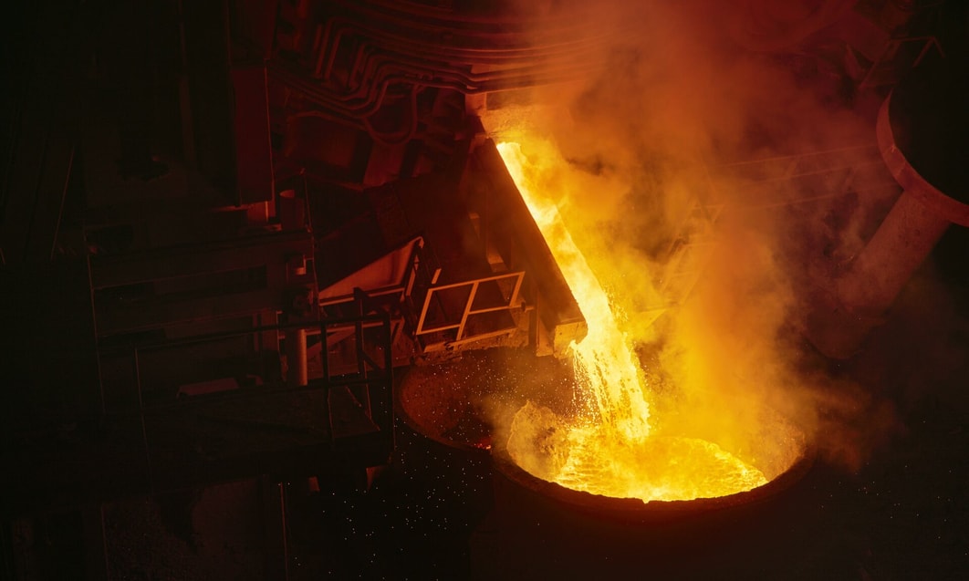 a large container with liquid pouring out of it