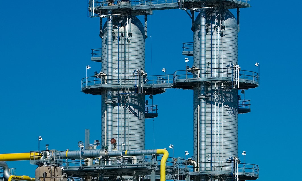 a large industrial plant with several towers