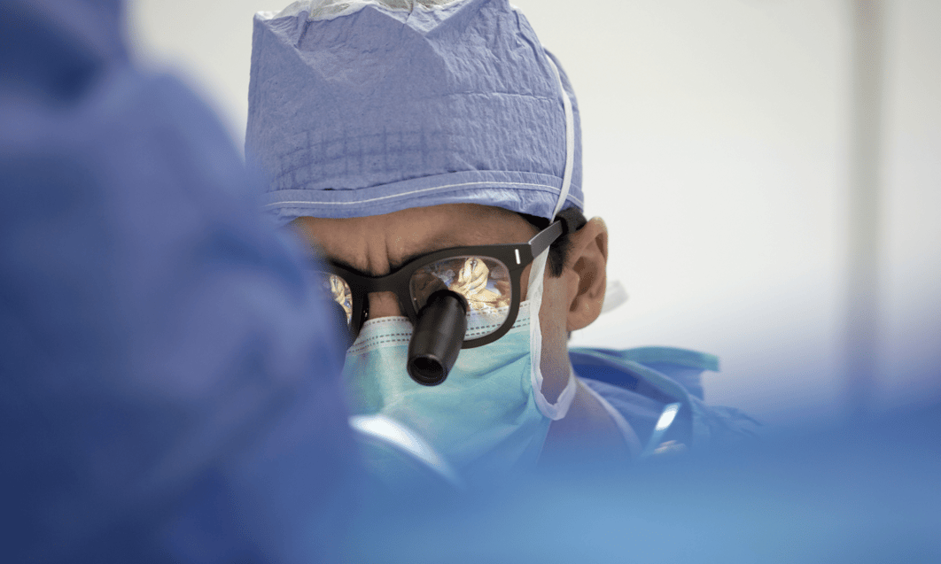 a person wearing a mask and glasses