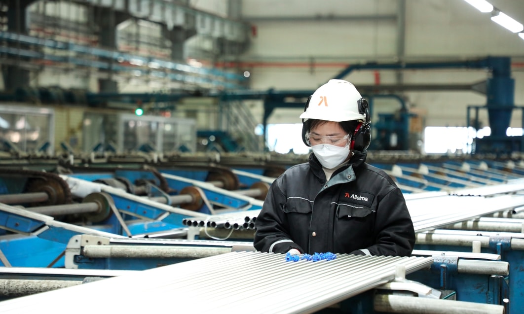 a person wearing a mask and a white helmet
