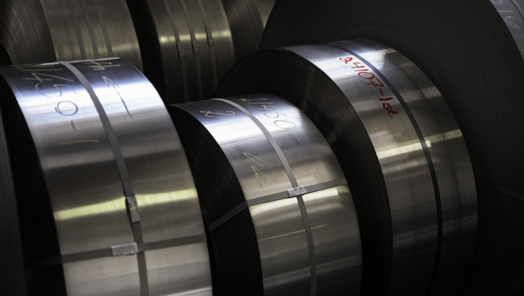 rolls of steel coils in a warehouse