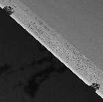 a black and white photo of a white surface