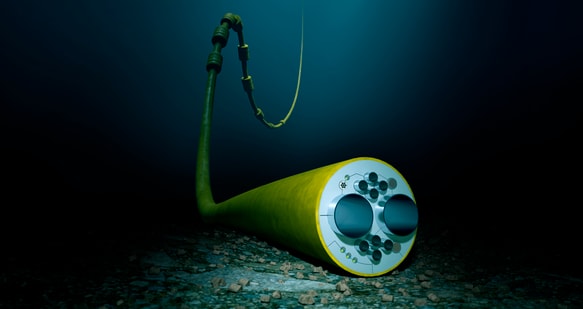 a green tube with a long cable