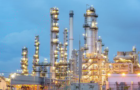 a large industrial plant with persony towers