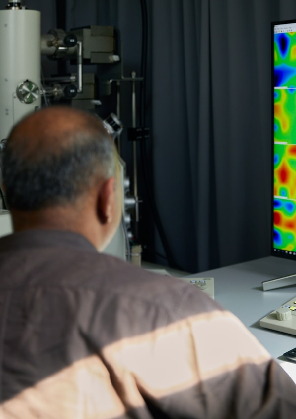 a person looking at a computer screen