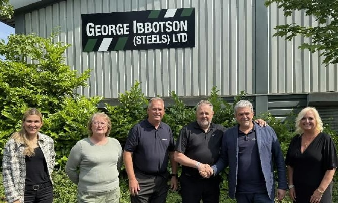 a group of people standing in front of a building