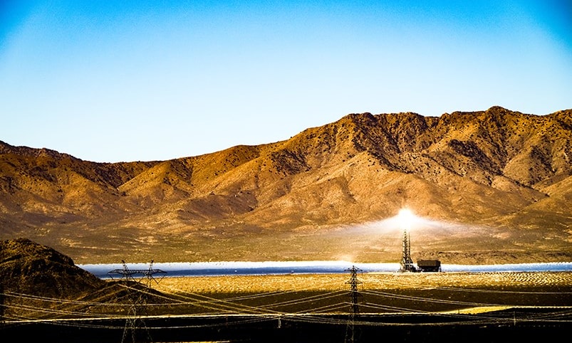 a large field with a light on it