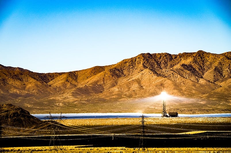 a large field with a light on it
