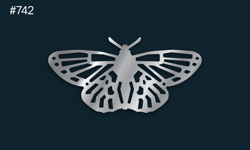 a silver butterfly on a dark background